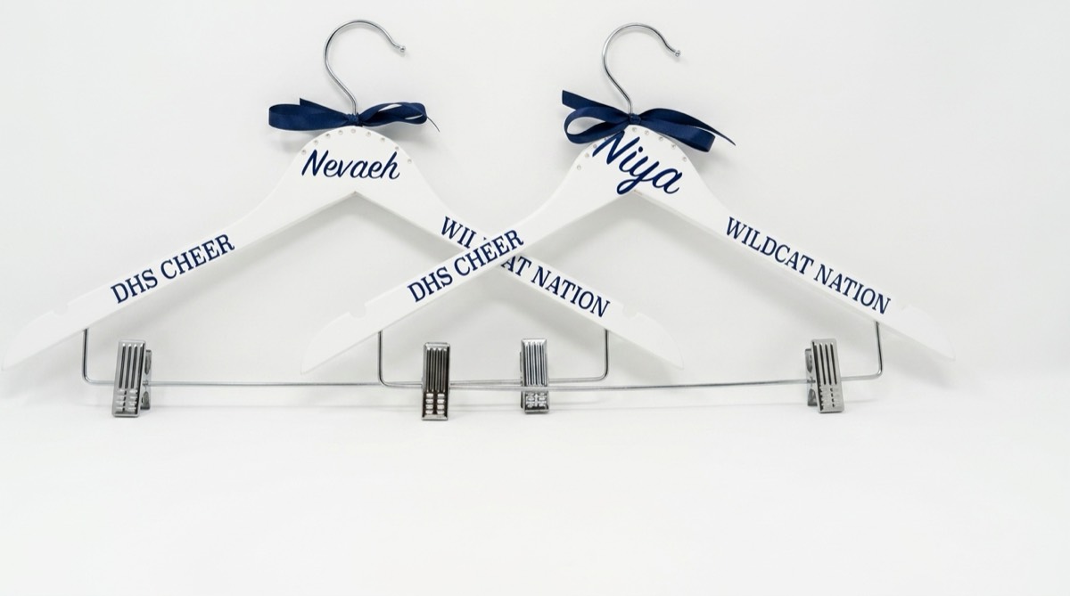 Custom double cloth hangers displayed as a product set